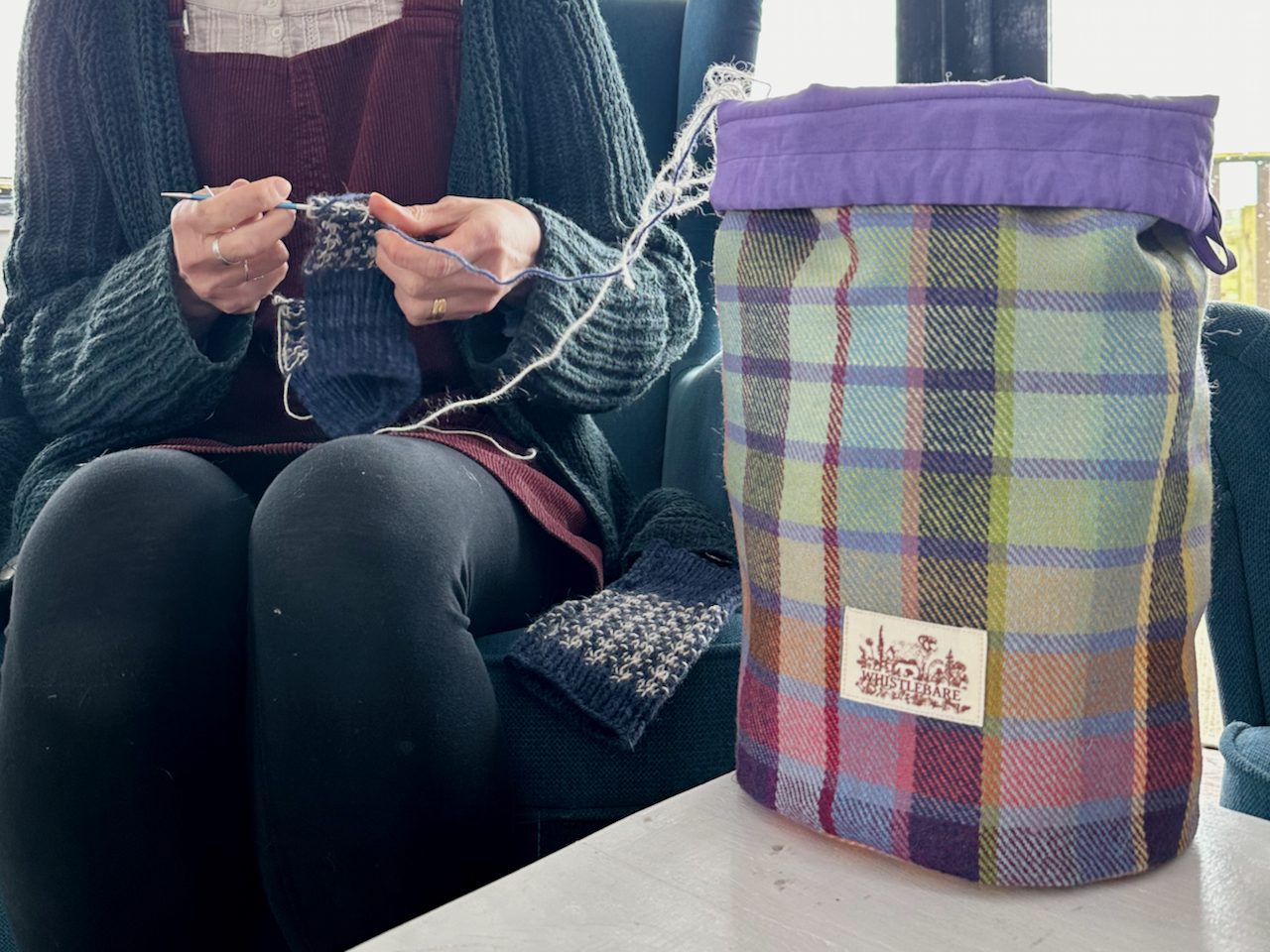 Whistlebare Tweed Dunstanburgh drawstring bag with knitting